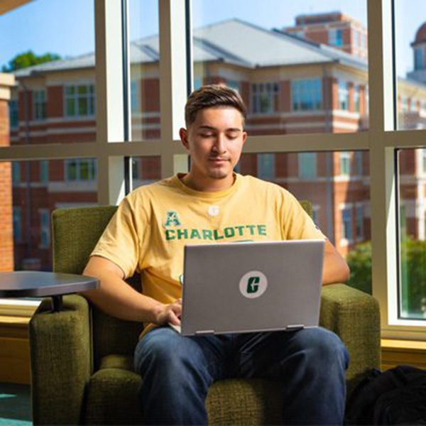 Student studying on a laptop