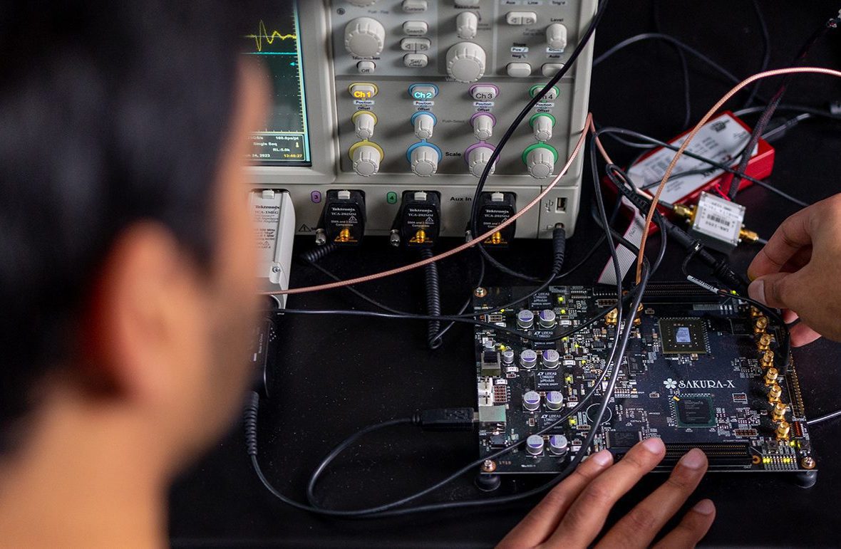 Student working on a computer board